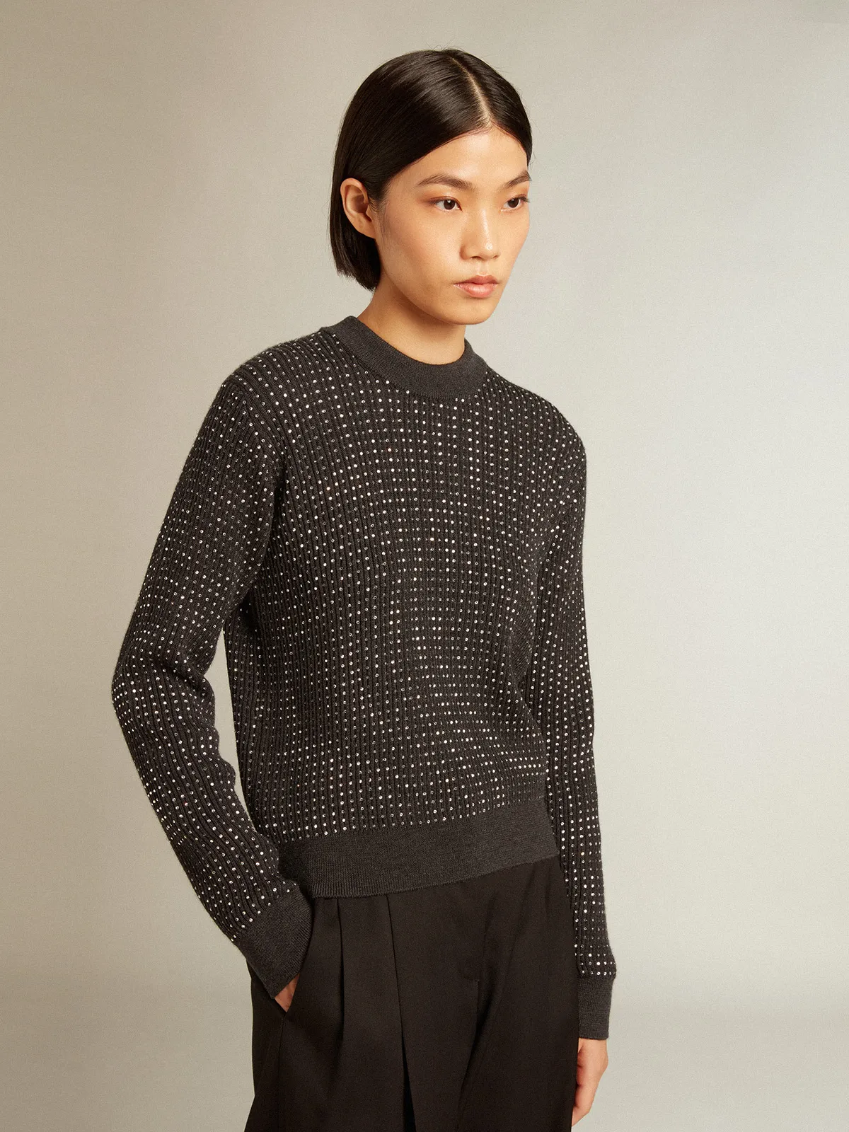 Round-neck sweater in merino wool with all-over crystals