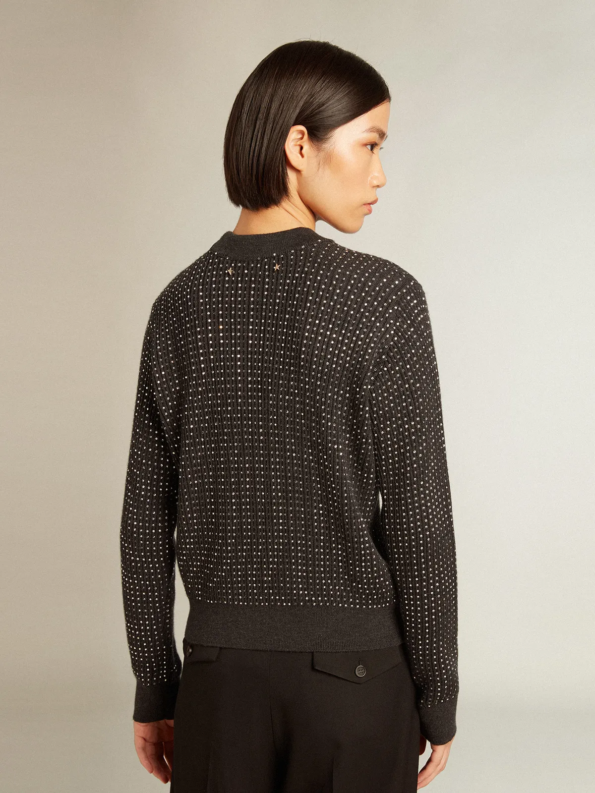 Round-neck sweater in merino wool with all-over crystals