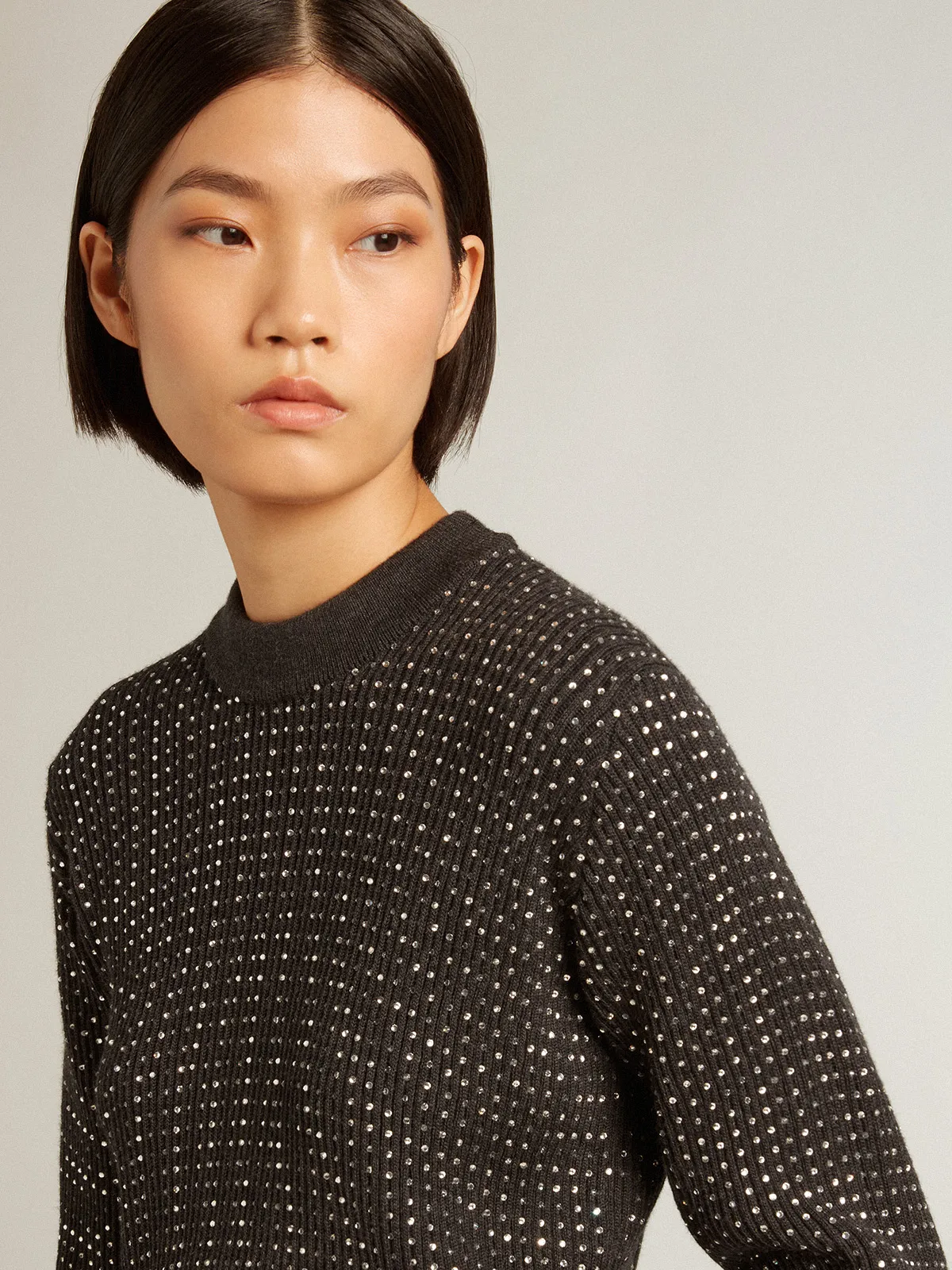 Round-neck sweater in merino wool with all-over crystals